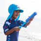 Junge spielt am Strand mit UV Schwimmanzug "Under The Sea"