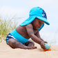 Junge trägt den UV Sonnenhut "Under the Sea" mit Nackenschutz