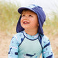 Junge trägt den UV Sonnenhut "Vintage Moby" am Strand